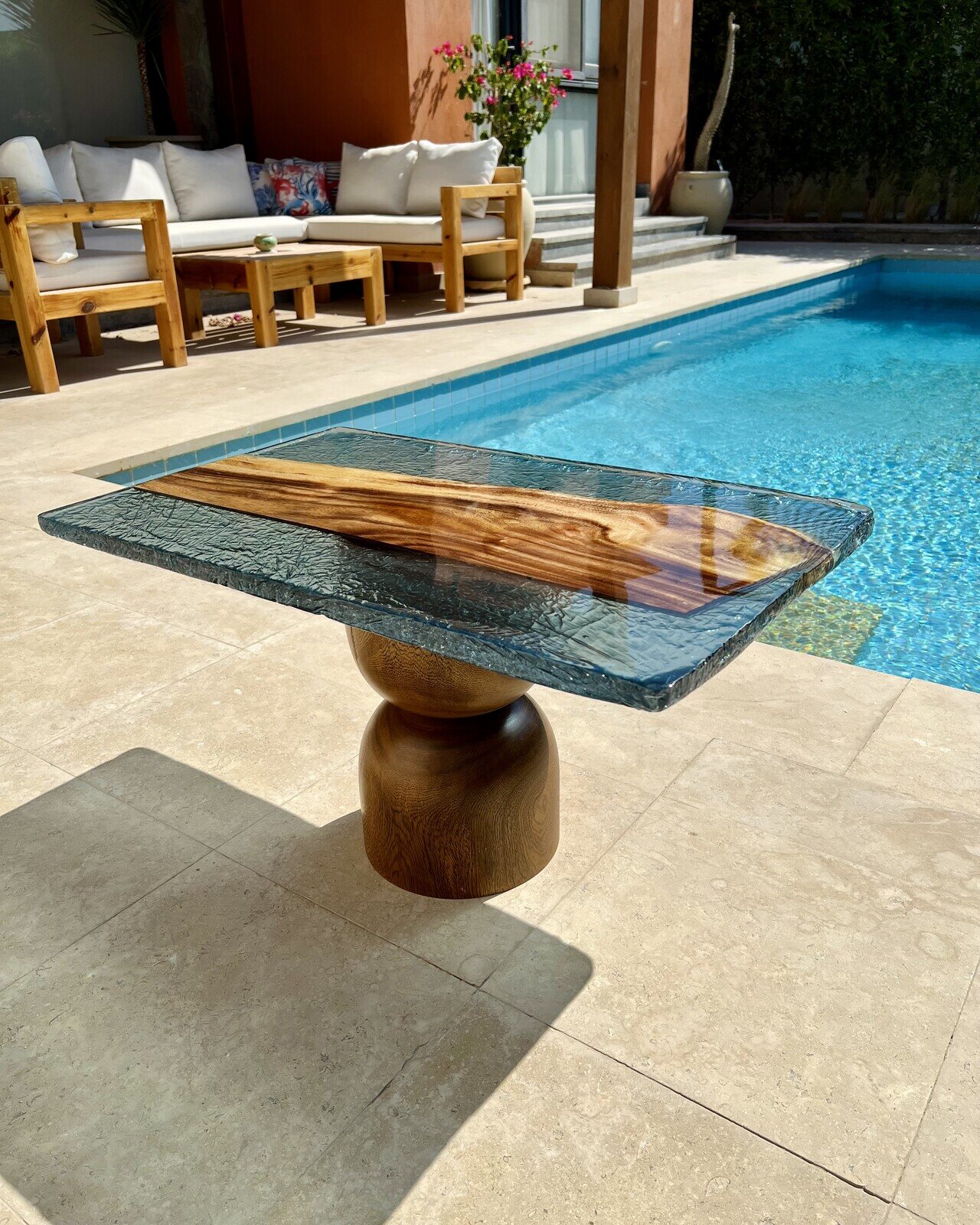 Strata — live-edge wood in Red Sea turquoise resin, on a hand-turned pedestal